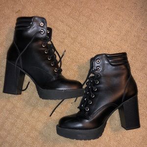 Black heeled combat boots